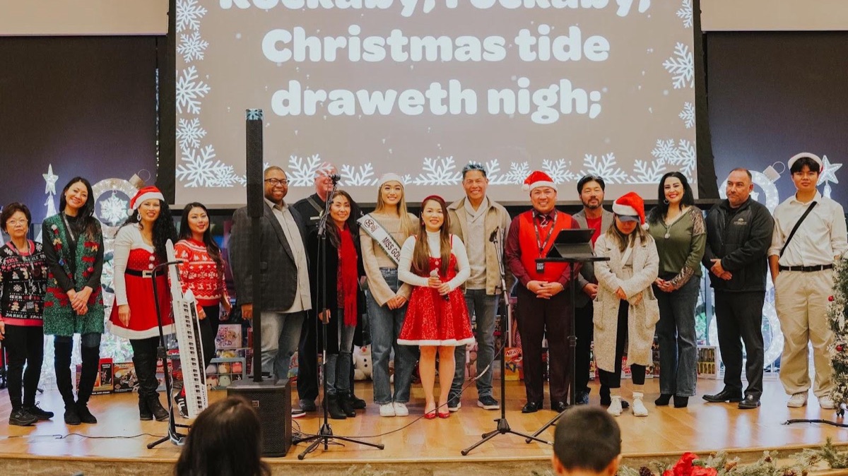 Community members on stage at the Elk Grove Toy Drive Celebration